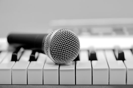 Close-up classical microphone on electronic keyboard 