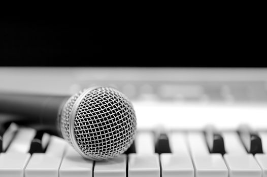 Close-up classical microphone on electronic keyboard 