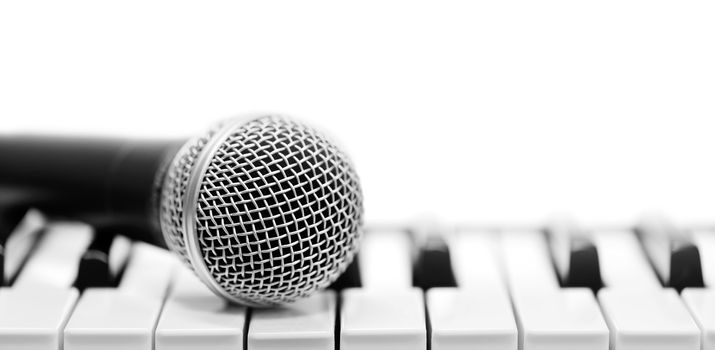 Close-up classical microphone on electronic keyboard 