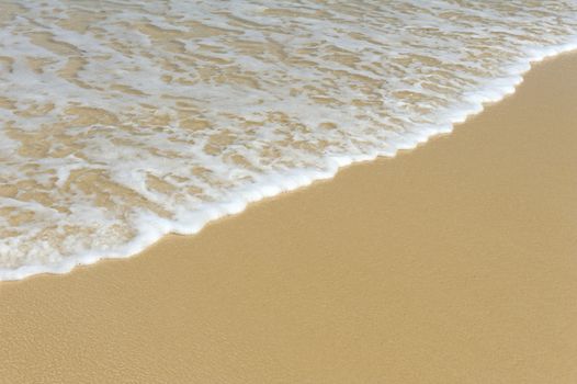 Soft wave of the sea on the sandy beach