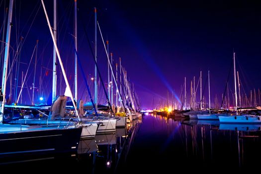 Yachts at a wharf at night in Turkey