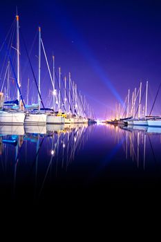 Yachts at a wharf at night in Turkey