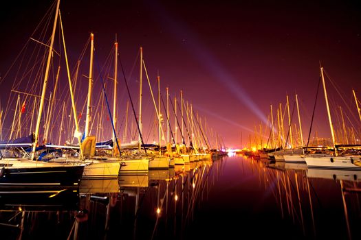 Yachts at a wharf at night in Turkey