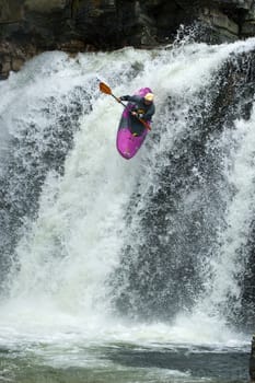 Kayaker in the waterfall in Norway, Ula river.