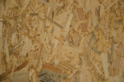 Close up of a recycled compressed wood chipboard Useful as background
