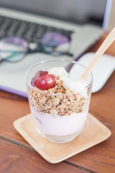 Granola with fruits on work station, stock photo