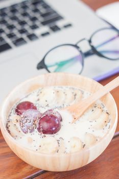 Granola with fruits on work station, stock photo