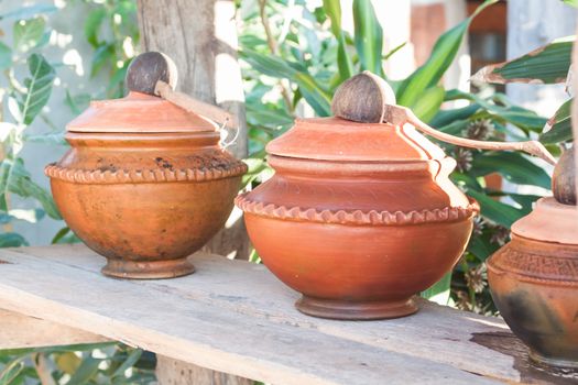 Clay pot filled with water, stock photo