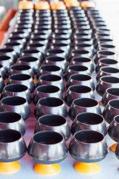 Monk's alms-bowl in temple, stock photo