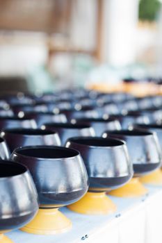 Monk's alms-bowl in temple, stock photo