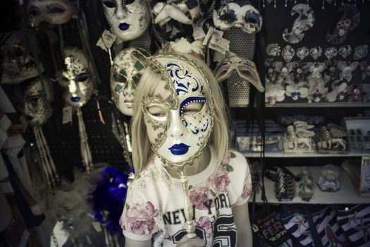 Girl and Venetian Mask. Italia, Venice.