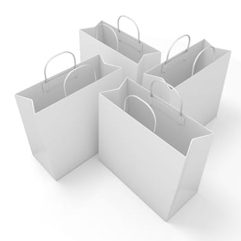 Empty paper bags, arranged and isolated on white. Side view