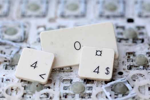 A close view of some keys on a dirty, yellowed keyboard.error 404 text