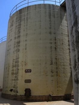 Large concrete silo against the blue sky