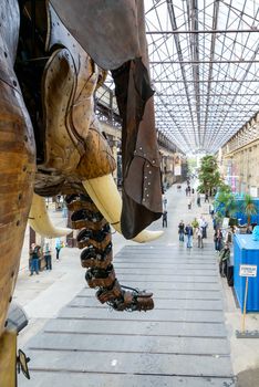 NANTES, FRANCE - CIRCA SEPTEMBER 2015: The Great Elephant goes for a walk with passengers aboard.