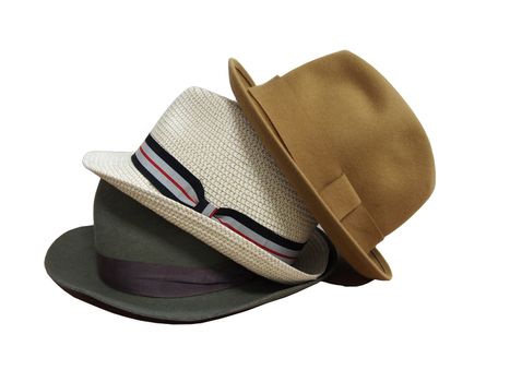 three colored men's hats. on a white background