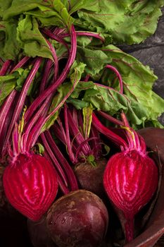 Beet root in wooden bowl. Seasonal vegetable harvest. Healthy eating. 