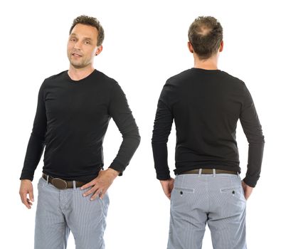 Photo of a man posing with a blank black long sleeve shirt, ready for your artwork or design.