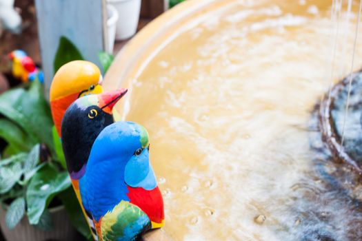 Bird ornaments in the garden, stock photo