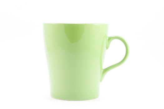 Green mug isolated on white background, stock photo