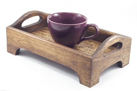 Coffee cup on wooden tray isolated on white background, stock photo
