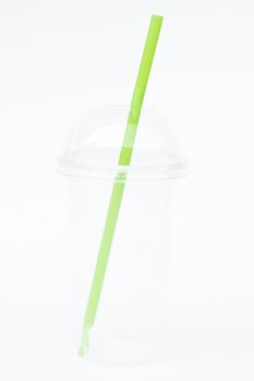 Empty plastic cup with straw isolated on white background, stock photo