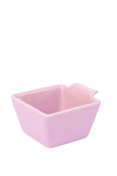 Pink ceramic bowl isolated on white background, stock photo