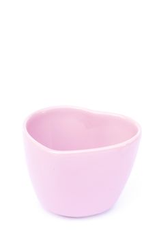 Pink ceramic bowl isolated on white background, stock photo