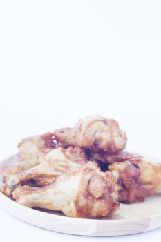 Grilled chicken wings isolated on white background, stock photo