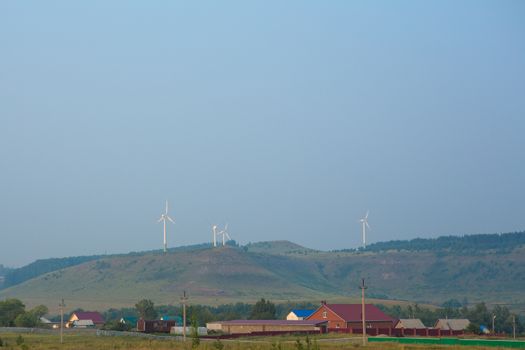 large group of windmills for renewable electric energy