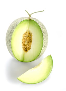 shopped green melon isolated on white background