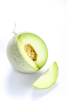 shopped green melon isolated on white background