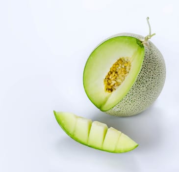 shopped green melon isolated on white background
