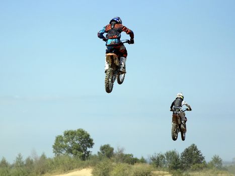 ARSENYEV, RUSSIA - AUG 30: Rider participates in the round of the 2014 Russia motocross championship on August 30, 2014 in Arsenyev, Russia.