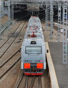 Beautiful photo of high speed modern commuter train, motion blur