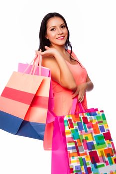 Beautiful happy woman with shopping bags on shoppingspree, consumer lifestyle concept.
