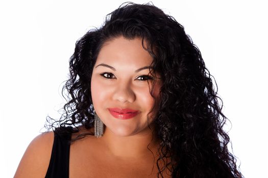 Beautiful happy face of full plus sized latina with long curly hair, beauty skincare makeup concept.