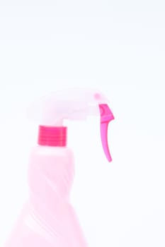 Pink plastic foggy spray bottle isolated on white background, stock photo