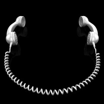 White old fashioned telephone handset isolated on a black