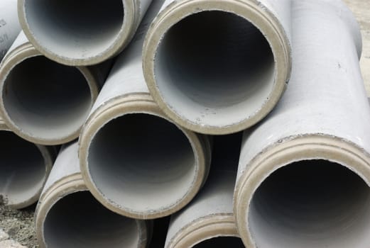 concrete street sewer construction pipes stacked