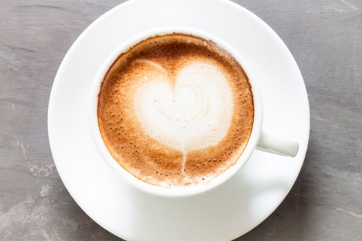 Coffee cup on grey background, stock photo
