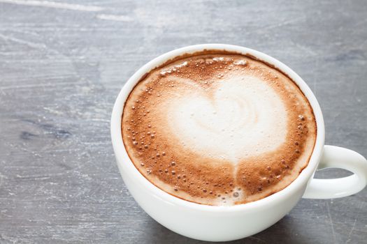 Coffee cup on grey background, stock photo