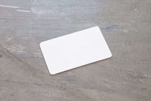 Name card on grey background, stock photo
