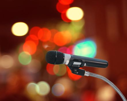              microphone in  hall with lights in background. with 
extremely shallow dof.                  