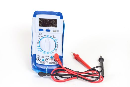 broken Digital multimeter on white background
