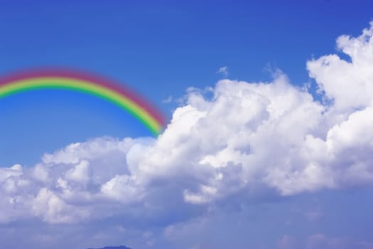 Blue sky and white cloud and rainbow