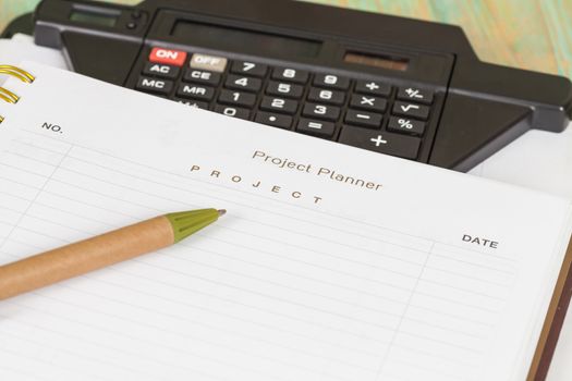 Closeup to agenda on project planner book
