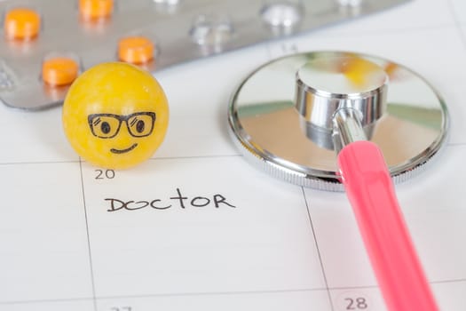 The words Doctor written on a Calendar to Remind you an Important Appointment
