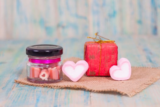 candies sweets heart in bottle on table
