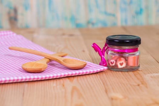 candies sweets heart in bottle on table